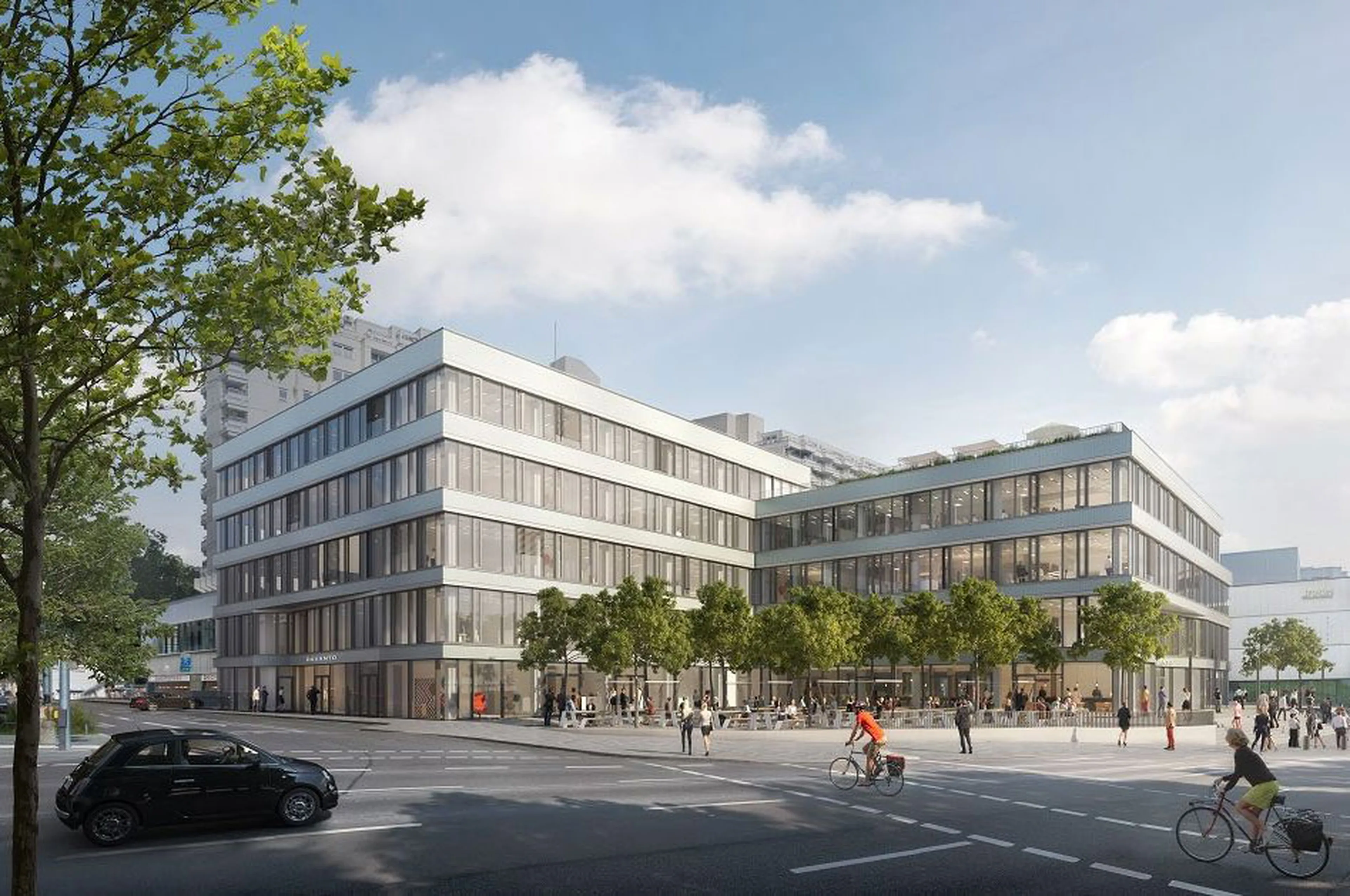 Modern office building with glass walls, trees, and people on a bustling street. Cyclist and car in the foreground under a partly cloudy sky.